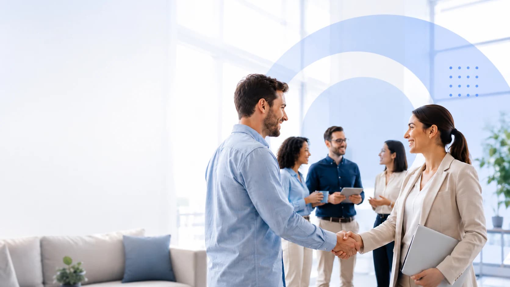 Business partners meeting and shaking hands